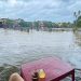 Hoi An residents sip coffee sitting in floodwater