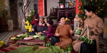 Vietnamese people preserving cultural values of traditional Tet