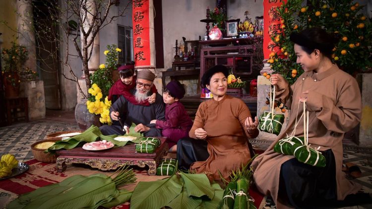 Vietnamese people preserving cultural values of traditional Tet
