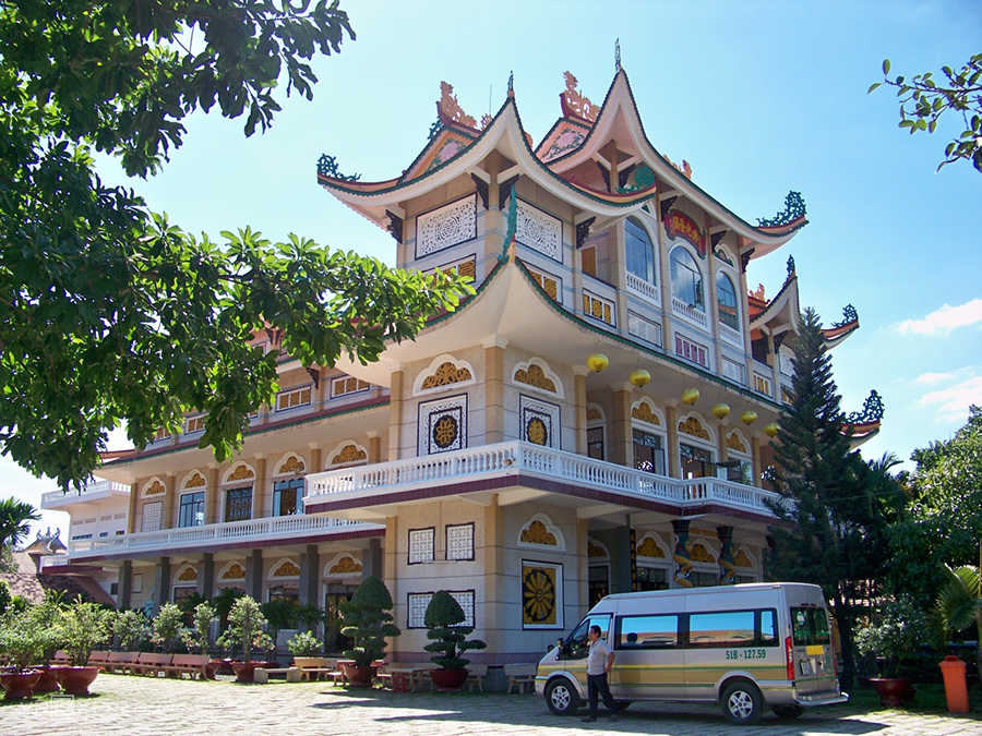 Golden pancake at Ni Viện Thiện Hòa, garnished with herbs.
